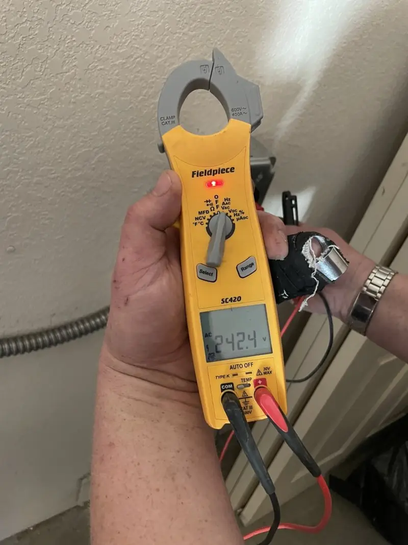 Voltage testing with clamp meter during Ceiling Fan Installation in Fountain Hill